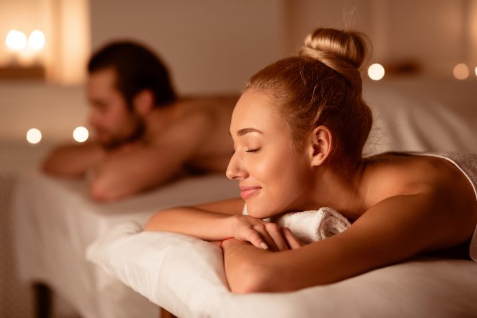 Spouses,Resting,After,Relaxing,Massage,Therapy,Lying,With,Eyes,Closed